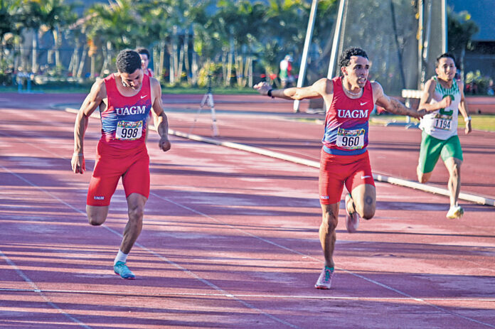 Adrian Canales y Yariel Pérez se destacan en los 200 metros. (Luis F. Minguela LAI)